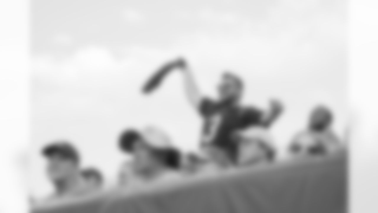 Third Down Guy waves a flag at Paycor Stadium during the Packers-Bengals preseason game on Friday, August 11, 2023.