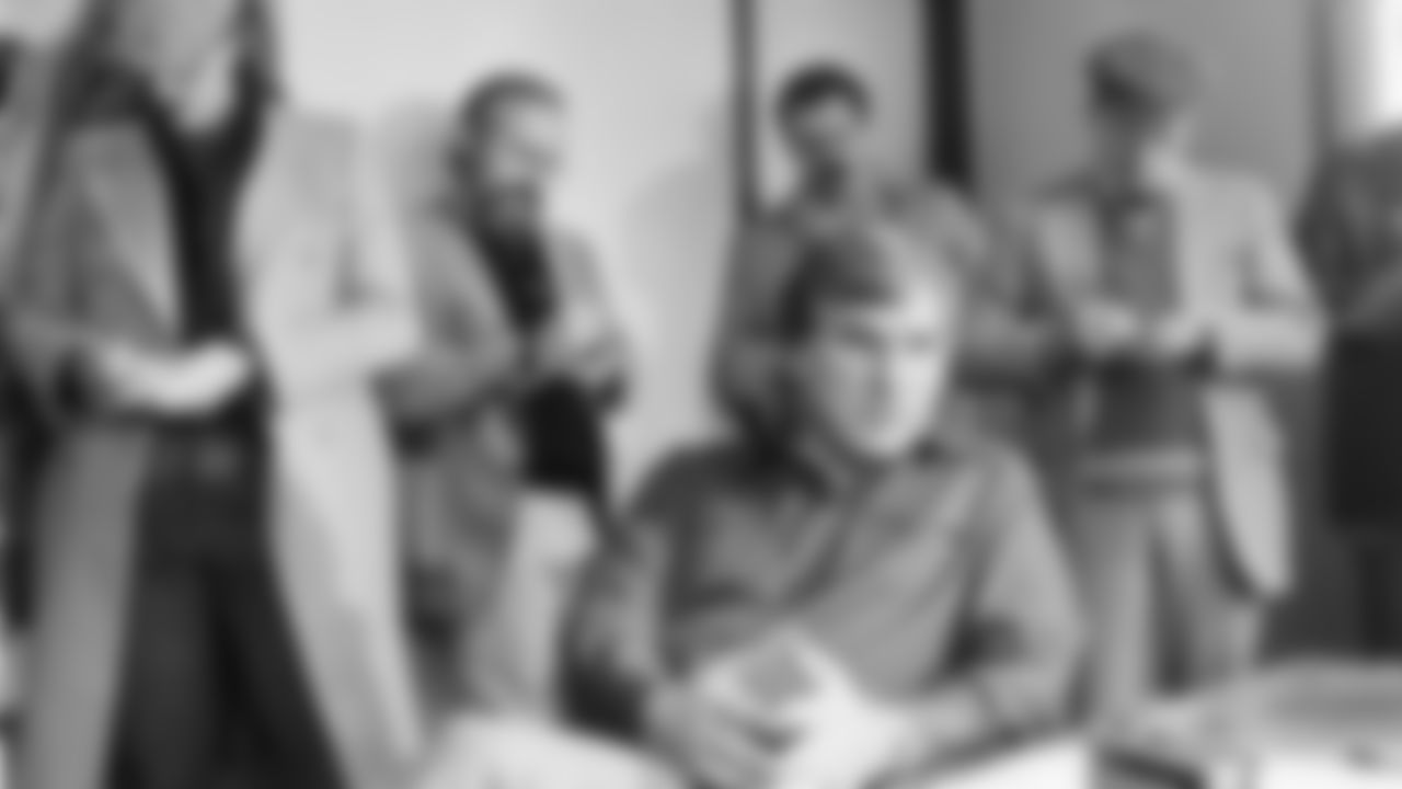 Cincinnati Bengals head coach Forrest Gregg is surrounded by sports writers as he holds a news conference in Cincinnati to recount his team's 27-7 win over the San Diego Chargers for the AFC title, Jan. 11, 1982. The Bengals will now meet the San Francisco 49ers in the Super Bowl. (AP Photo)