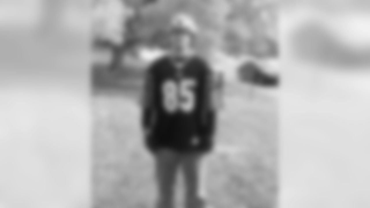 Here is a picture of my friend Tom. He's a Bills fan or was. So he has to pick one of these as his cover page for one week.