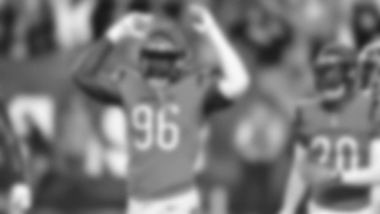 Defensive lineman Cam Sample pumps up the crowd during the fourth quarter against the Jacksonville Jaguars.
