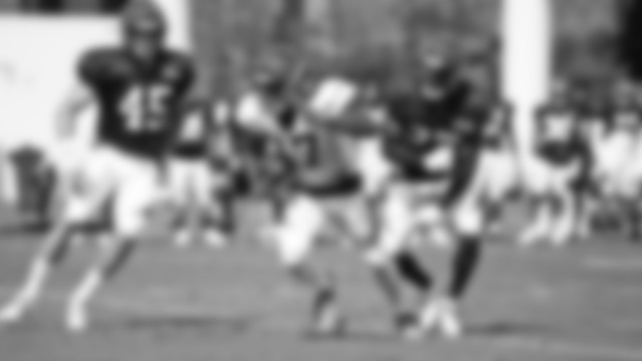 Wide receiver Stanley Morgan runs up field after making a reception during the team's first scrimmage.