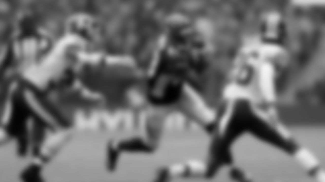 Cincinnati Bengals wide receiver Tyler Boyd (83) evades a tackle from Washington linebacker Keith Marshall (39) during an NFL Football game at Wembley Stadium in London, Sunday Oct. 30, 2016. (AP Photo/Tim Ireland)