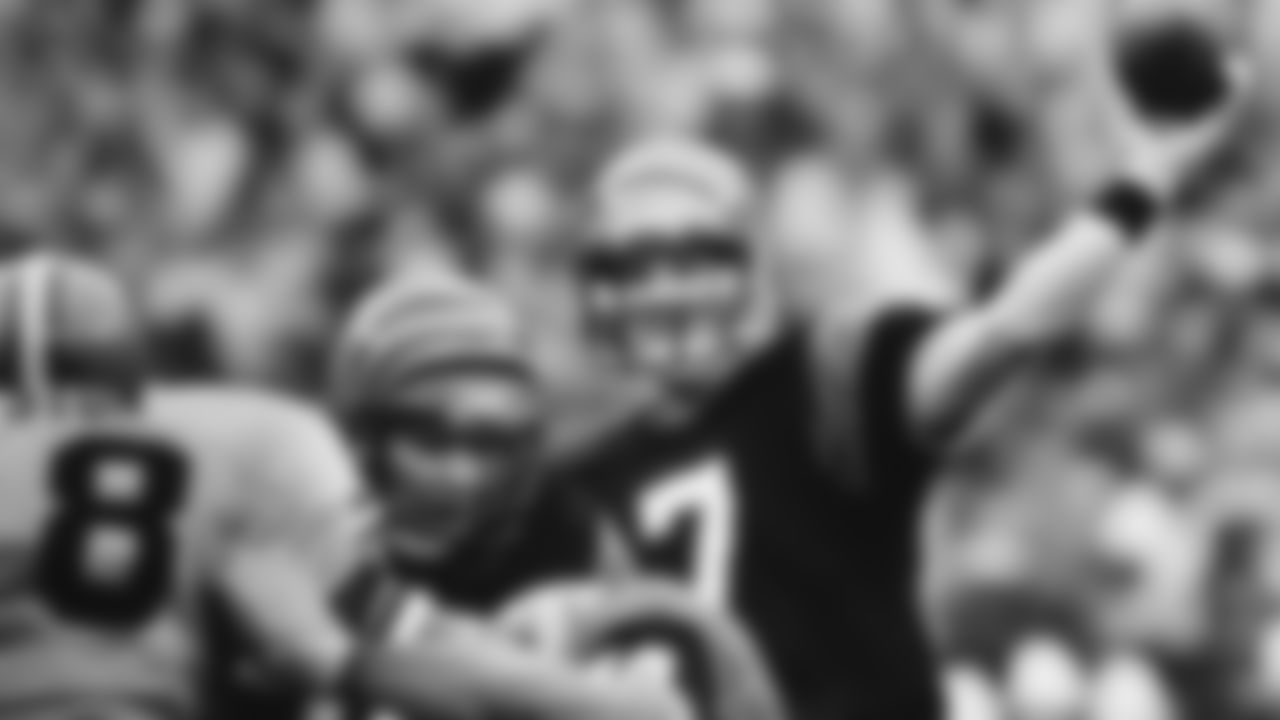 Cincinnati Bengals quarterback Boomer Esiason unleashes a pass during their game with the Cleveland Browns at Riverfront Stadium in Cincinnati, Nov. 11, 1985. Esiason was 23 for 33 with 262 yards and one touchdown pass in the Bengals 27-10 win. (AP Photo/Jim Callaway)