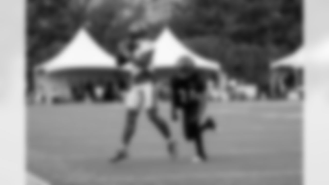 WR Ja'Marr Chase (left) catches the ball during the first day of Bengals Training Camp 2023 at Kettering Health Practice Fields on Wednesday, July 26 2023 in Cincinnati, Ohio.