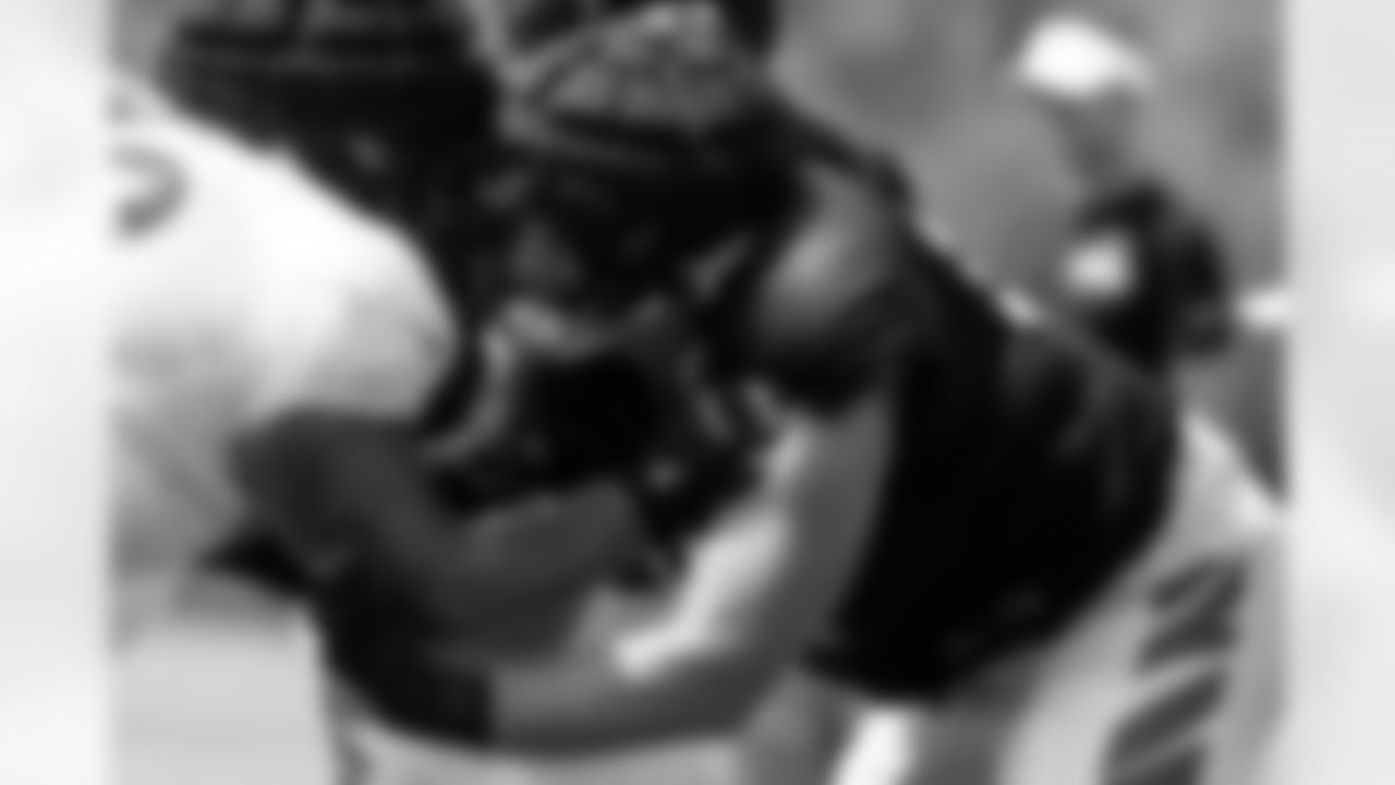 G Cordell Volson runs a play during training camp on Wednesday, August 23, 2023 at the Kettering Health Practice Fields in Cincinnati, Ohio.