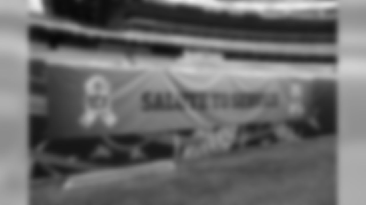 A Salute to Service banner hangs at Paul Brown Stadium before an NFL football game between the Cincinnati Bengals and the New Orleans Saints, Sunday, Nov. 11, 2018, in Cincinnati. (AP Photo/Frank Victores)