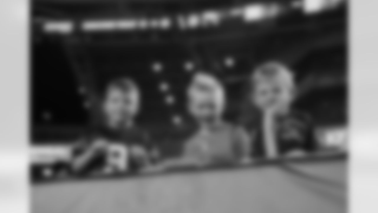 Fans pose for a photo at Paycor Stadium during the Packers-Bengals preseason game on Friday, August 11, 2023.
