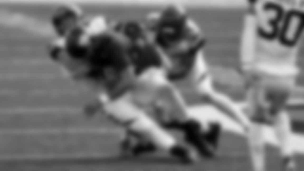 Cincinnati Bengals defensive end Sam Hubbard, left, tackles New York Giants quarterback Daniel Jones, middle, as Cincinnati Bengals strong safety Vonn Bell, defends during an NFL football game, Sunday, Nov. 29, 2020, in Cincinnati.