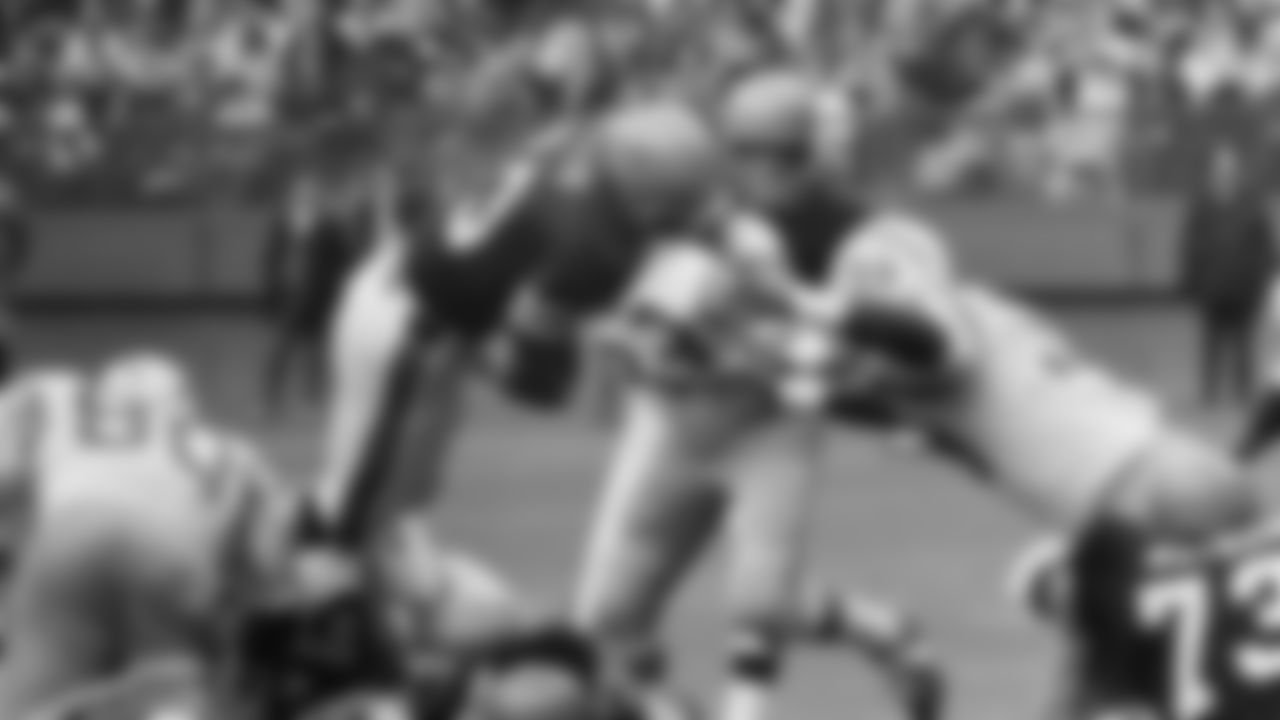 Cincinnati Bengals Fred Willis stepped over several bodies and then leaped into the end zone from the three-yard-line to score Cincinnati?s first touchdown against San Diego in a NFL game here on Sunday, Nov. 29, 197. At right are chargers Mel Rogers (53) and Pete Barnes (59). Bengals won, 31-0. (AP Photo/GS)