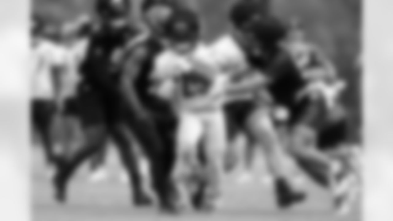 HB Chris Evans runs the ball during the first day of Bengals Training Camp 2023 at Kettering Health Practice Fields on Wednesday, July 26 2023 in Cincinnati, Ohio.