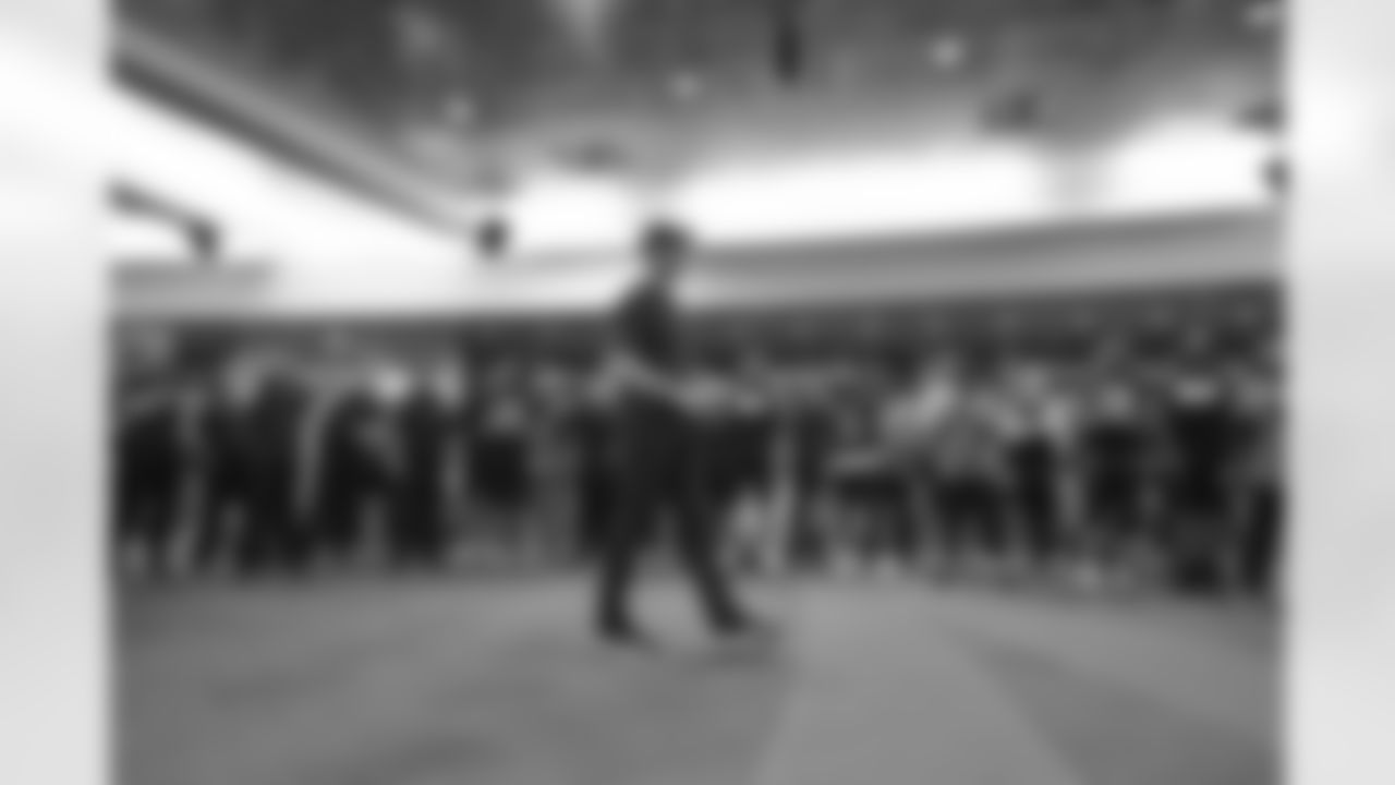 Head Coach Zac Taylor walks in the locker room before giving out game balls after the Bengals-Panthers game in Week 9 of the 2022 season.