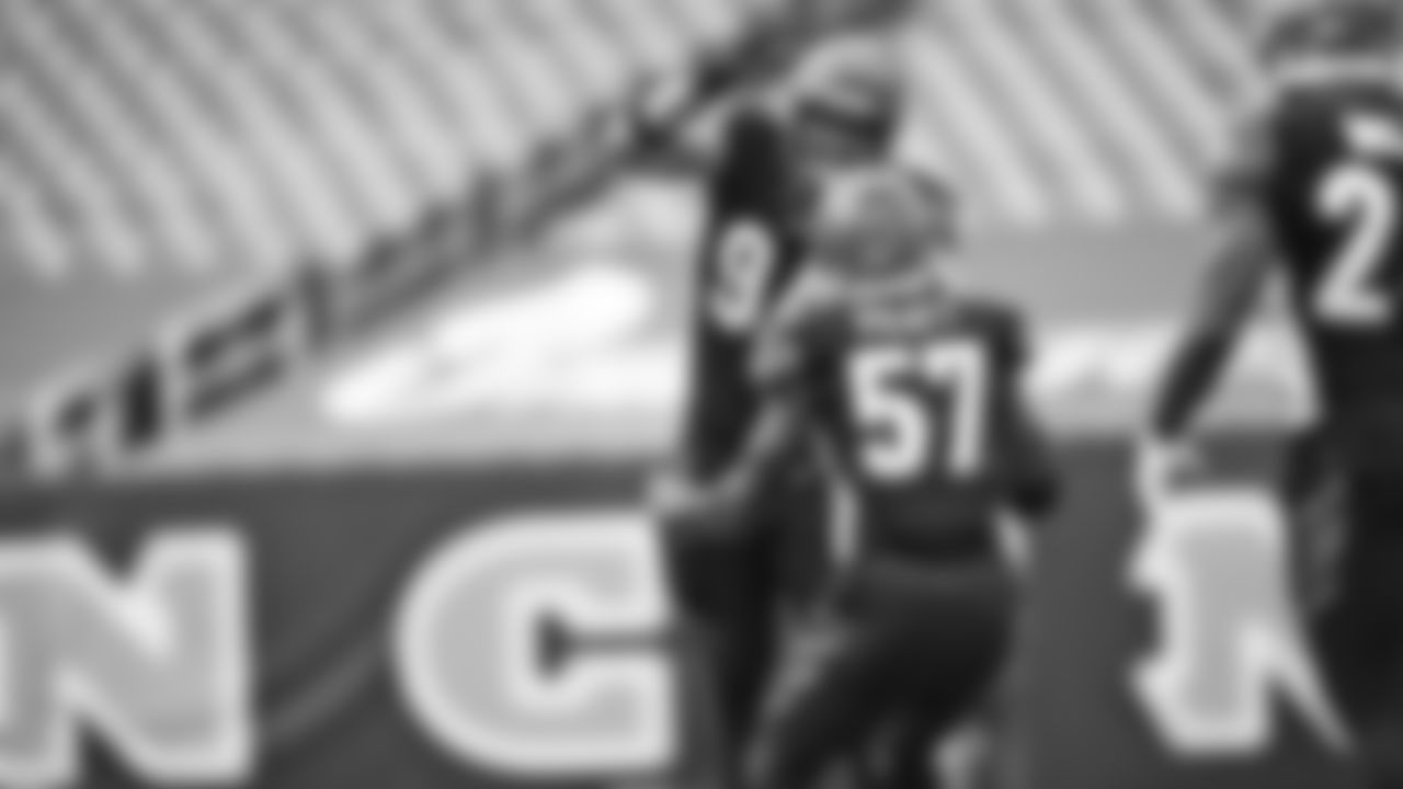 Bengals defensive end Sam Hubbard celebrates with linebacker Germaine Pratt after a making a tackle in the season opener against the Los Angeles Chargers.
