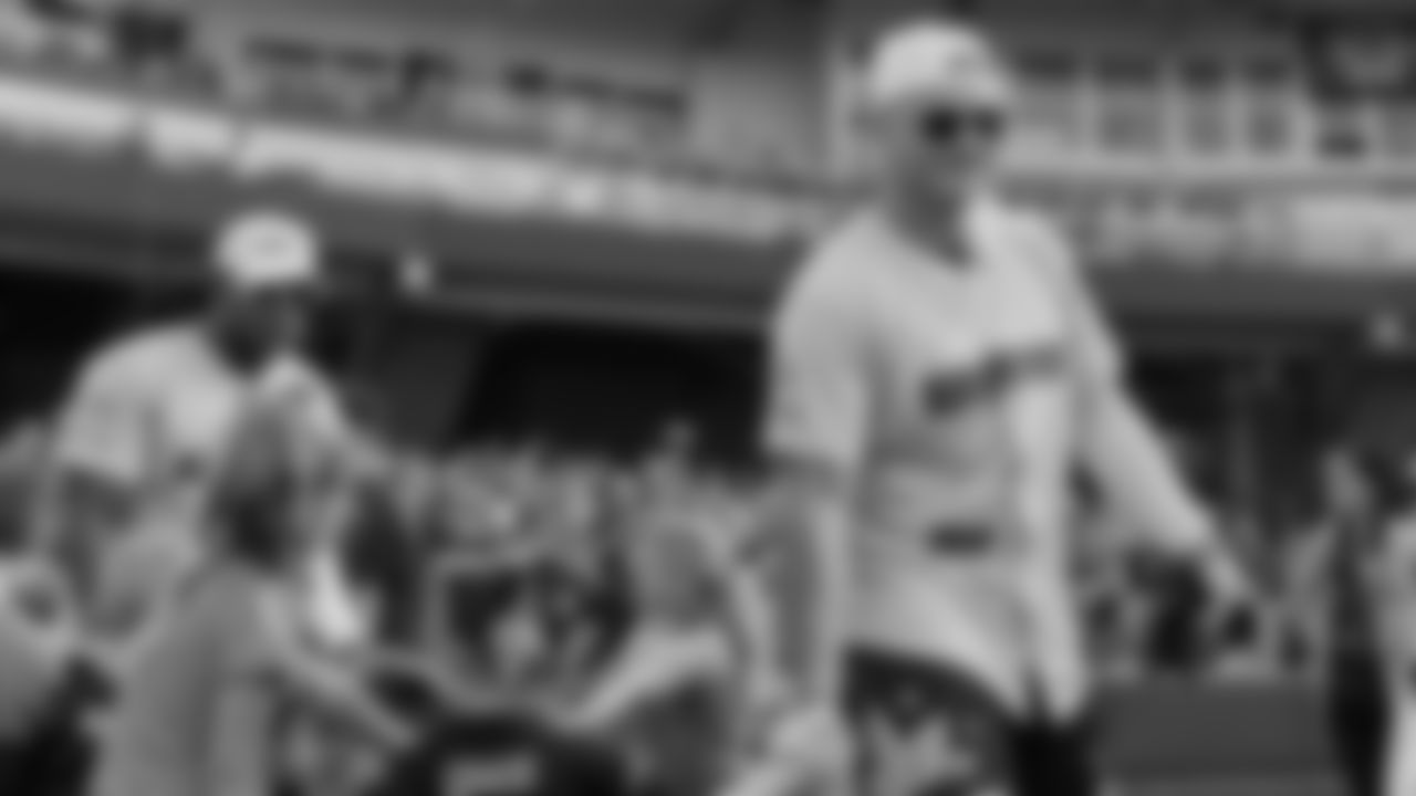Logan Wilson high-fives kids at his charity softball tournament in Dayton, Ohio on Wednesday, June 14th, 2023.