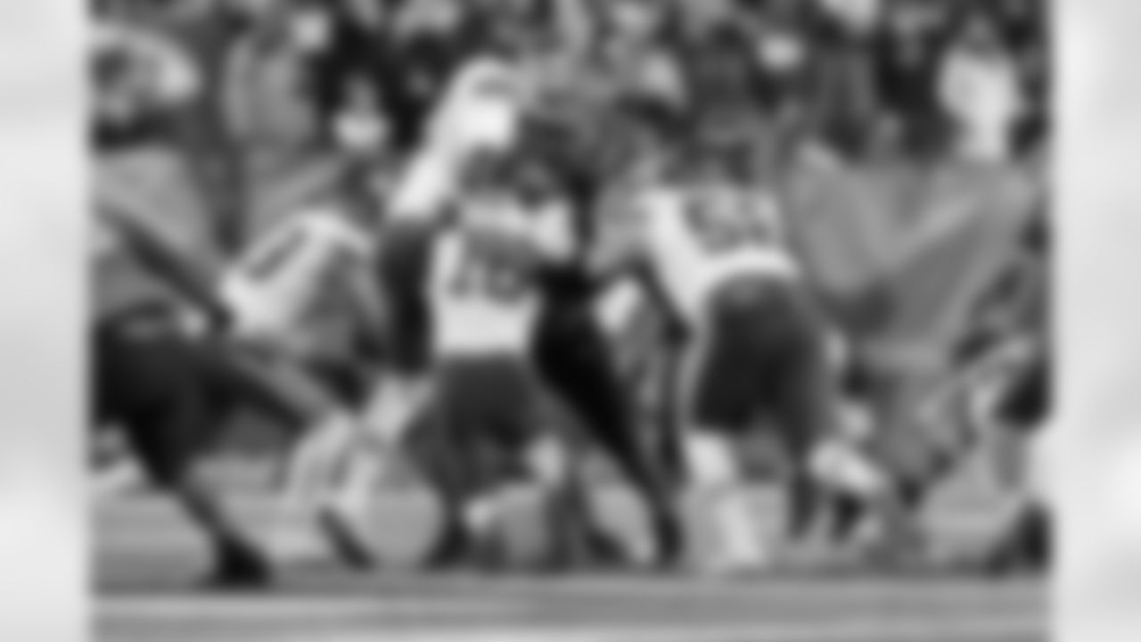 DT BJ Hill tackles the ball carrier during the fourth quarter of the Bengals-Chiefs game in Week 13 of the 2022 season at Paycor Stadium in Cincinnati, Ohio.