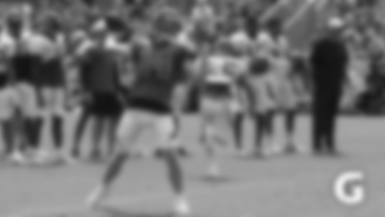 Quarterback Andy Dalton heaves a pass during a training camp practice.