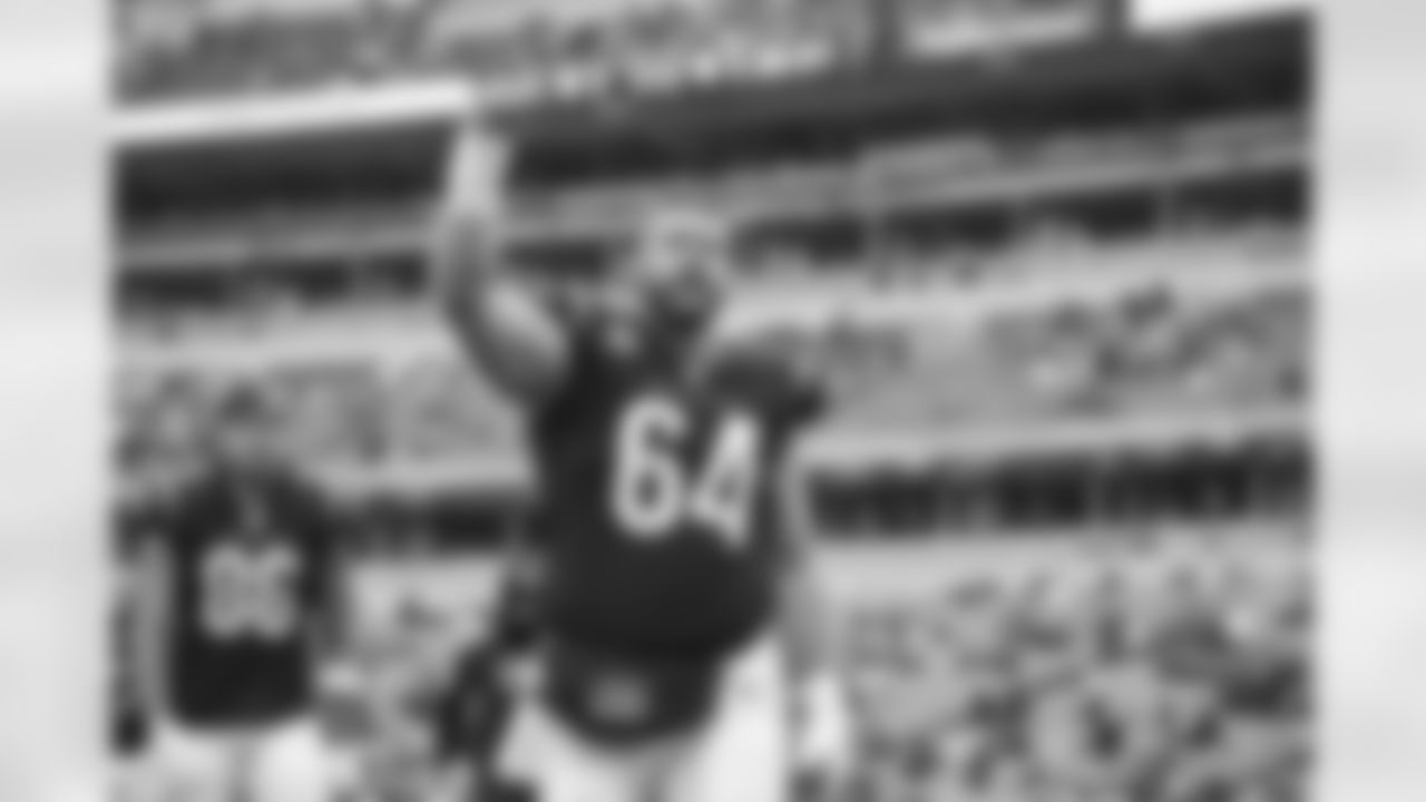 C Ted Karras calls out to the fans during warmups before the Bengals faced the Cleveland Browns in Week 14 at Paycor Stadium in Cincinnati, Ohio.