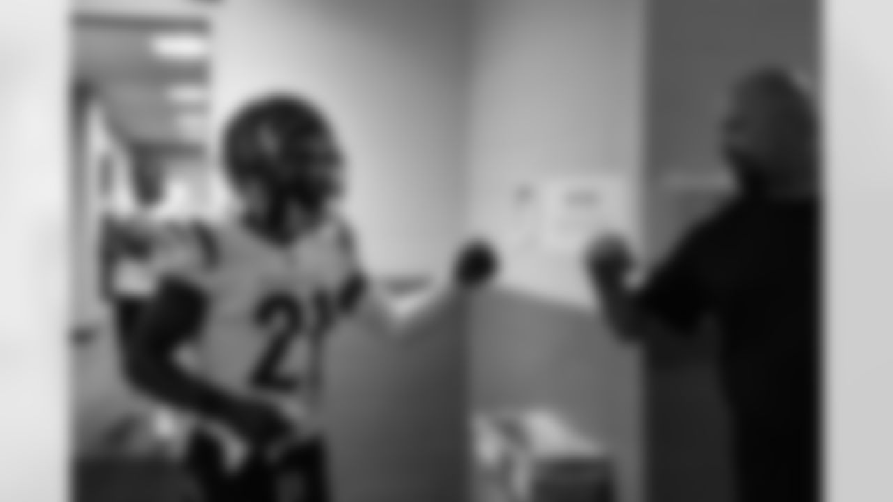 CB Mike Hilton fist-bumps Assitant Linebacker Coach Derek Frazier before kickoff of the Bengals-Falcons game in week 2 of the 2023 preseason.