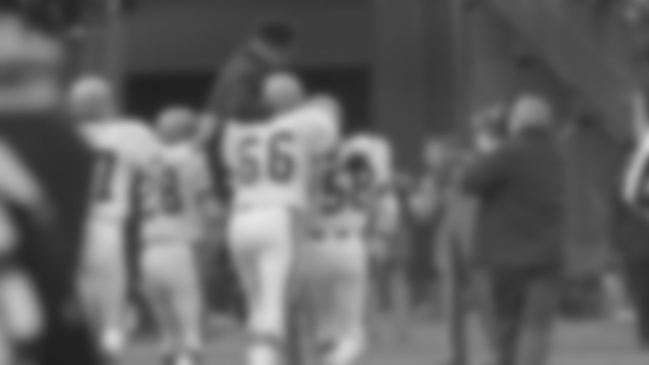 Paul Brown, Hall of Fame Class of 1967, is hoisted by Bill Bergey (66), Al Beauchamp (58), and John Guillory (28) on Dec. 20, 1970, and given a ride to the dressing room after the Bengals beat the Boston Patriots, 45-7, to win the title in the Central Division of the American Conference of the NFL. The game took place in Cincinnati, Ohio (AP Photo/Gene Smith)