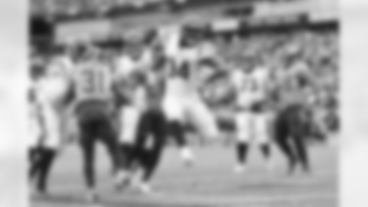 HB Samaje Perine leaps into the endzone for a touchdown during the second quarter of the Bengals-Titans game on Sunday, November 27 in Week 12 of the 2022 season.