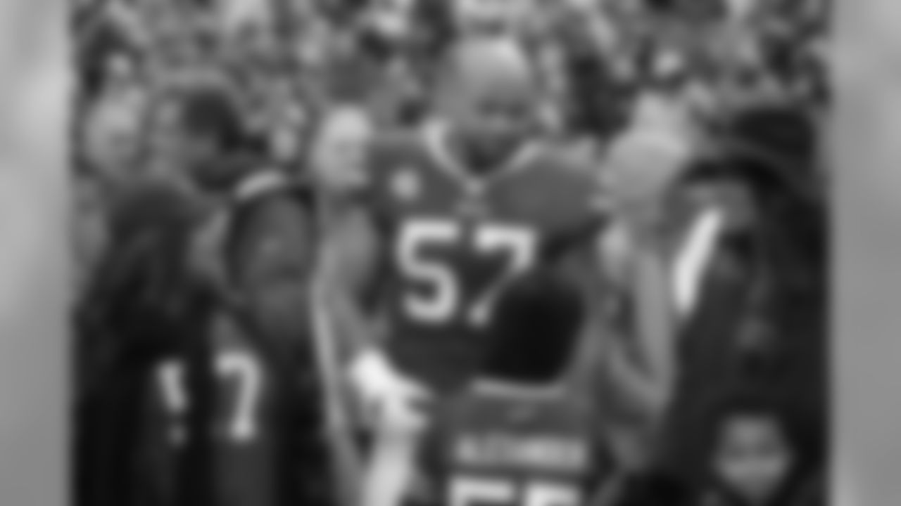 During his final season in 2019, Alexander was once again a captain and played in all 17 games for the Bills. He was a very versatile player and a valuable member of the defense and special teams. His work in the community will be something he looks to continue in the future and is something he is very proud of during his time in Buffalo.
Buffalo Bills outside linebacker Lorenzo Alexander (57) and family Buffalo Bills vs New York Jets, December 29, 2019 at New Era Field.
Photo by Bill Wippert