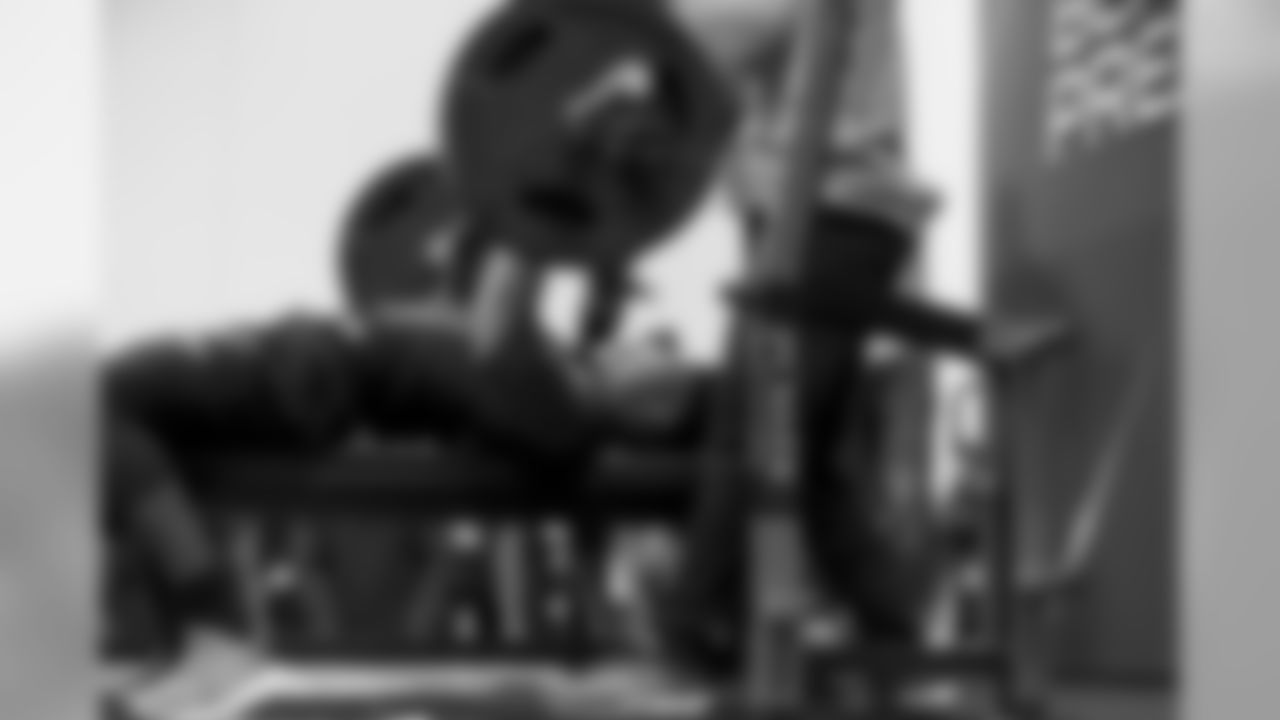 Measured at 6-3, 215 pounds. Recorded 21 reps on the bench press.