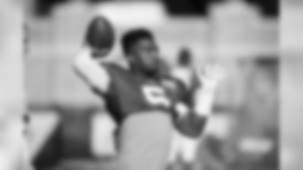 Quarterback Tyrod Taylor (5) reaches back to throw the ball.