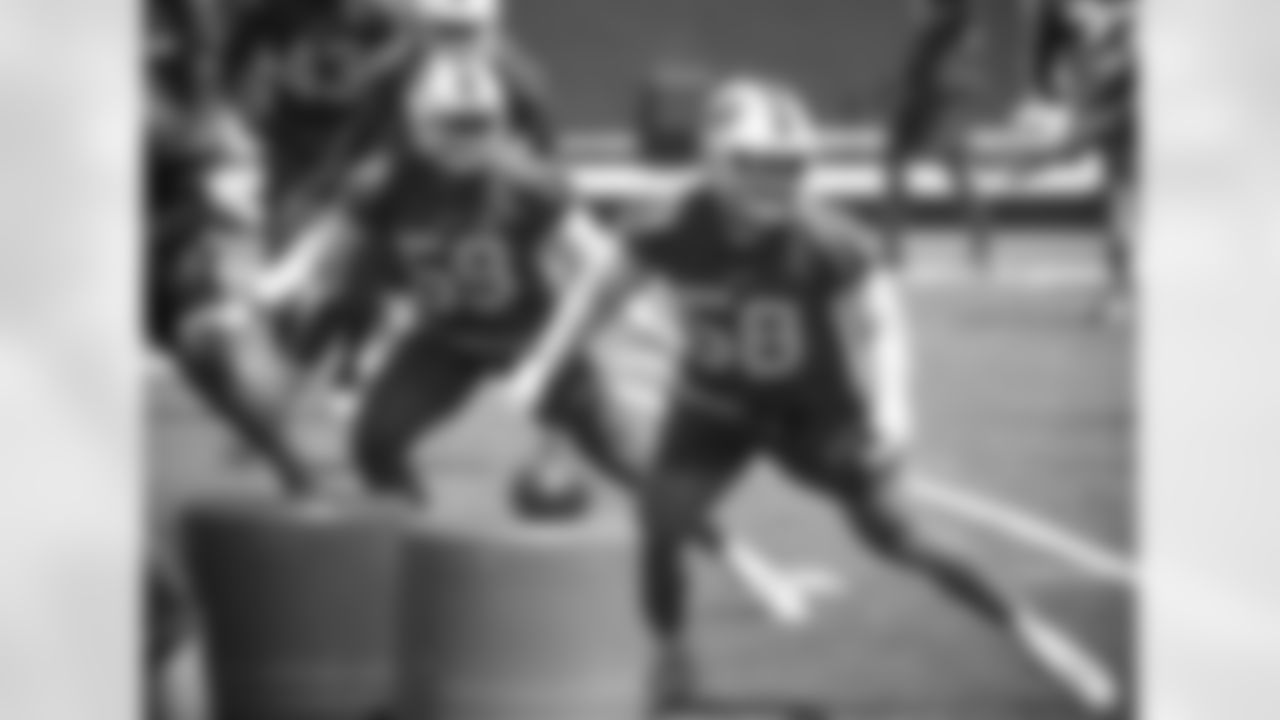 Andre Smith (59), Matt Milano (58). Buffalo Bills minicamp. June 16, 2021. Photo by Bill Wippert