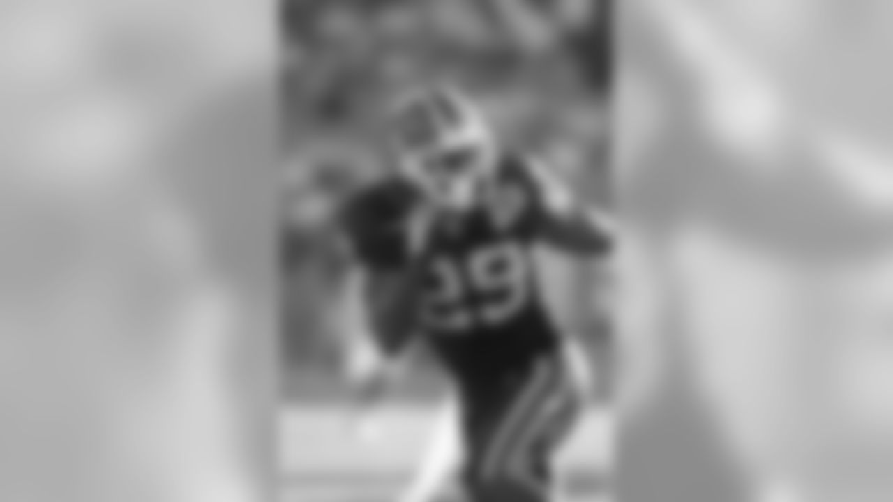 2009 | The uniforms feature a special 50th season anniversary patch, but remain the same otherwise.
Pictured is Drayton Florence (29)