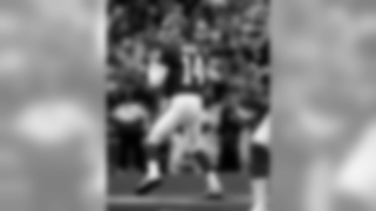 Frank Reich | 1985-1994
Reich played the third-most games at QB in franchise history with 93, and was a steady presence in the QB room for many years. The architect of "The Comeback Game" is now the head coach of the Colts.
Buffalo Bills quarterback Frank Reich (14) gets set to throw a pass during the AFC wild card game against the Houston Oilers Jan. 3, 1993, at Rich Stadium in Orchard Park, N.Y. The Bills defeated the Oilers 41-38.(Chuck Solomon via AP)