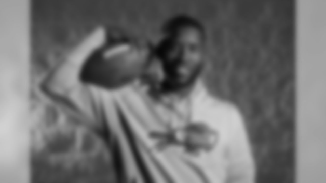 Wide receiver John Brown poses in Bills gear during his first visit to One Bills Drive