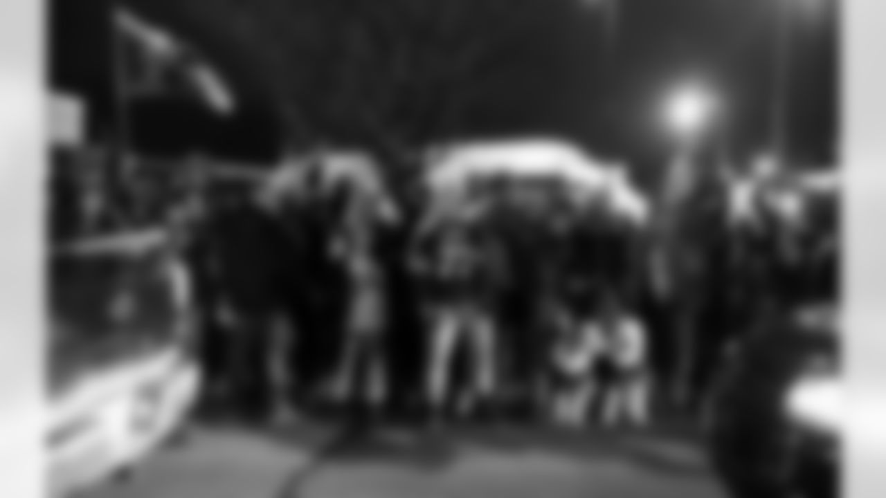 Fans greet the Buffalo Bills at the airport following their victorious return from New England, December 26, 2021. Photo by Bill Wippert
