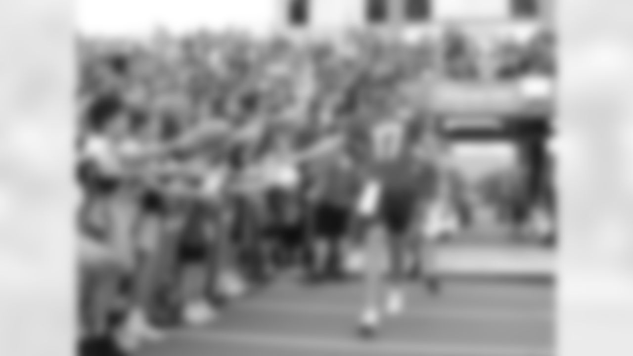 Josh Allen (17) heads to the field as the Buffalo Bills open Training Camp at St. John Fisher University, July 26, 2023.