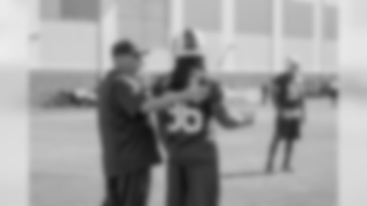 Head coach Rex Ryan and linebacker Jamari Lattimore talking during Week 2 of OTAs.