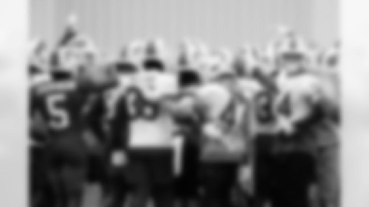 Josh Thomas (36) and Cam Lewis (47) in the huddle. Buffalo Bills Week 15 practice, December 16, 2021. Photo by James Acton