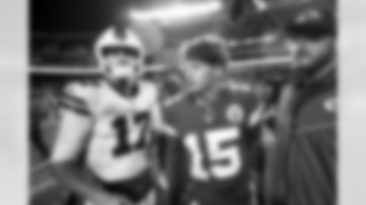Buffalo Bills quarterback Josh Allen (17) talks with Kansas City Chiefs quarterback Patrick Mahomes (15) after an NFL game, Sunday, Oct. 10, 2021 in Kansas City, Mo. The Bills defeated the Chiefs 38-20. (Kevin Sabitus via AP)