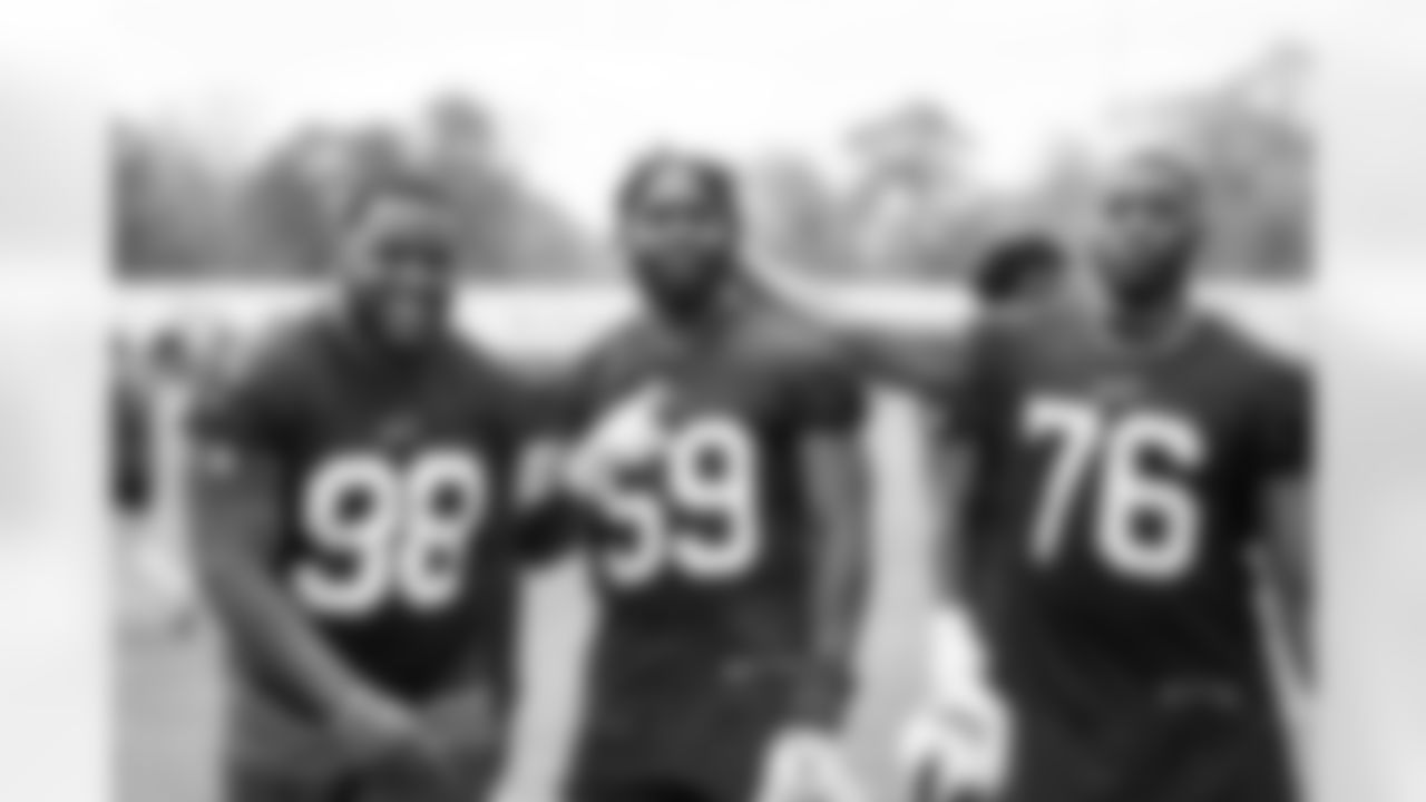 Kingsley Jonathan (59) and Daniel Joseph (76) practices during the first day of Rookie Mini Camp at One Bills Drive on May 13, 2022. Photo by Ben Green