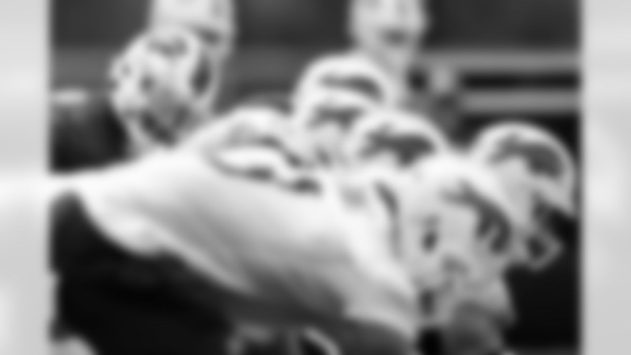 Josh Allen (17) and Mitch Morse (60). Week Three of Buffalo Bills OTA's on June 6, 2022. Photo by Ben Green