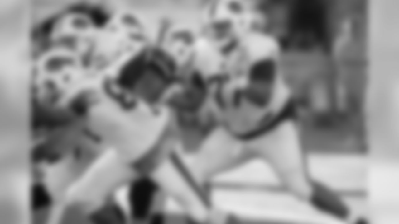 Offensive tackle Cordy Glenn (77) a prepares for a block.