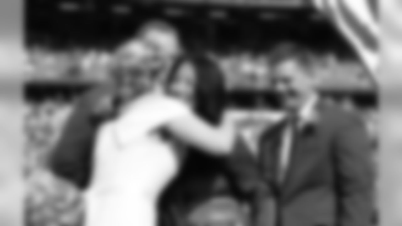 The Buffalo Bills celebrate the marriage of Mackenzie Park and Jordan Binggeli, the winning couple from the ÒHalftime Wedding Experience of a LifetimeÓ contest, at New Era Field on September 29, 2019. Photo by Bill Wippert