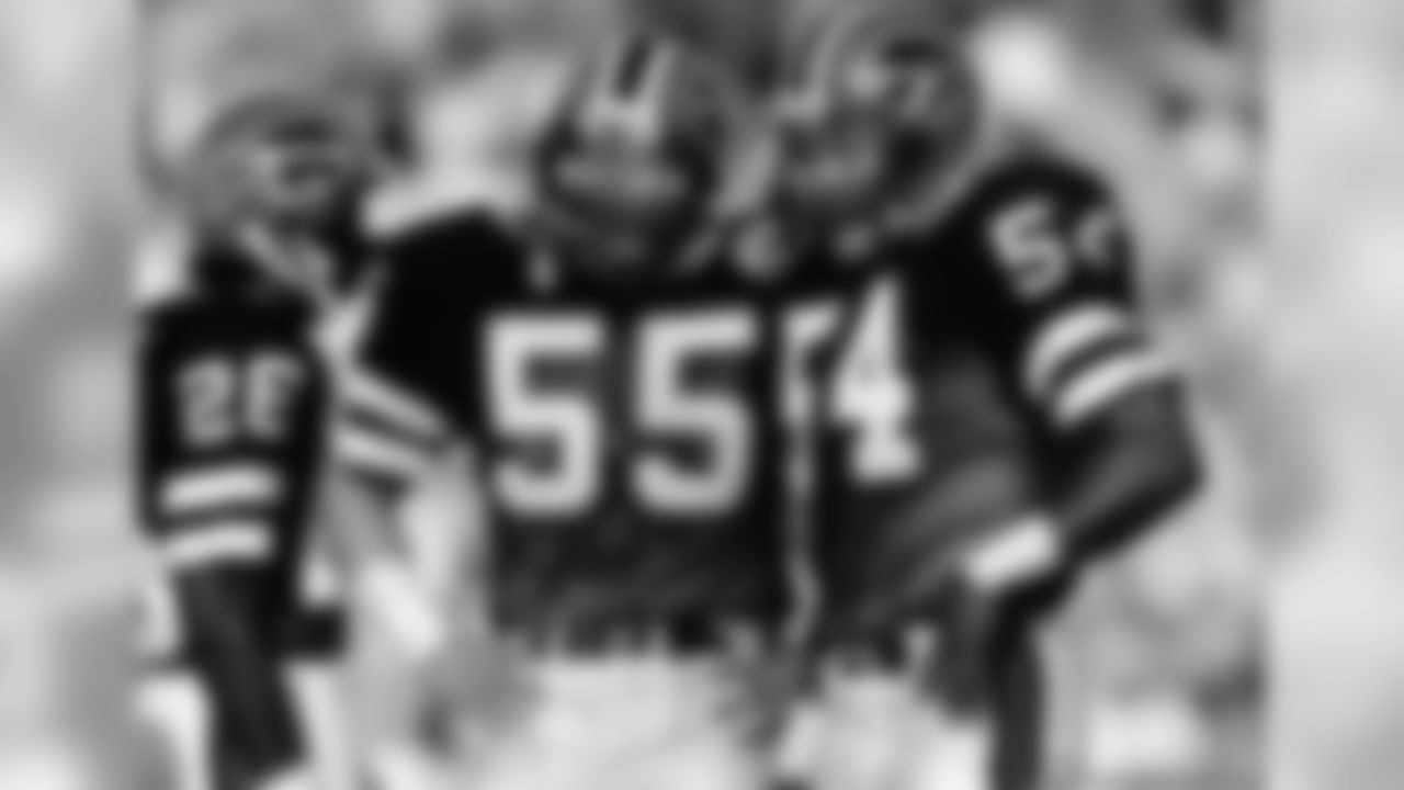1984 | Red helmets are introduced for the first time. It's believed that head coach Kay Stephenson wanted the change to be made, as the other three teams in the division at the time also wore white helmets. The Bills along with the 7 other original AFL teams wore a 25th anniversary patch during 1984 as well.
Linebacker Jim Haslett (55) of the Buffalo Bills sets for play during an NFL football game in 1984.