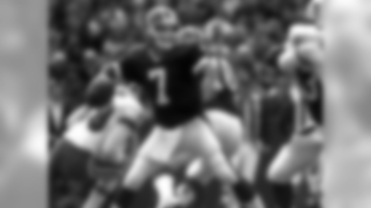 Doug Flutie | 1998-2000
Flutie threw for over 7500 yards to go along with 47 touchdowns in 39 games with Buffalo. Flutie returned to Buffalo for the first time since leaving the Bills during the 2019 season.
Buffalo Bills quarterback Doug Flutie throws from the pocket against the Miami Dolphins during the eastern conference match-up at Rich Stadium Sunday, Nov. 1, 1998. Flutie led the Bills to victory with three touchdown passes. Buffalo won 30-24. (AP Photo/Kevin Rivoli)