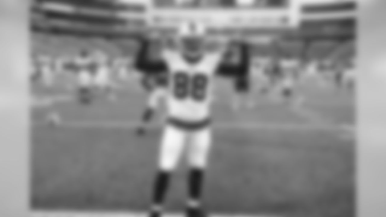 Wide receiver Marquise Goodwin poses on the field before the game.