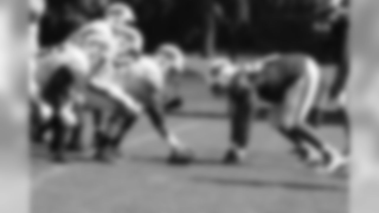 The offensive line gets ready to hike the ball.