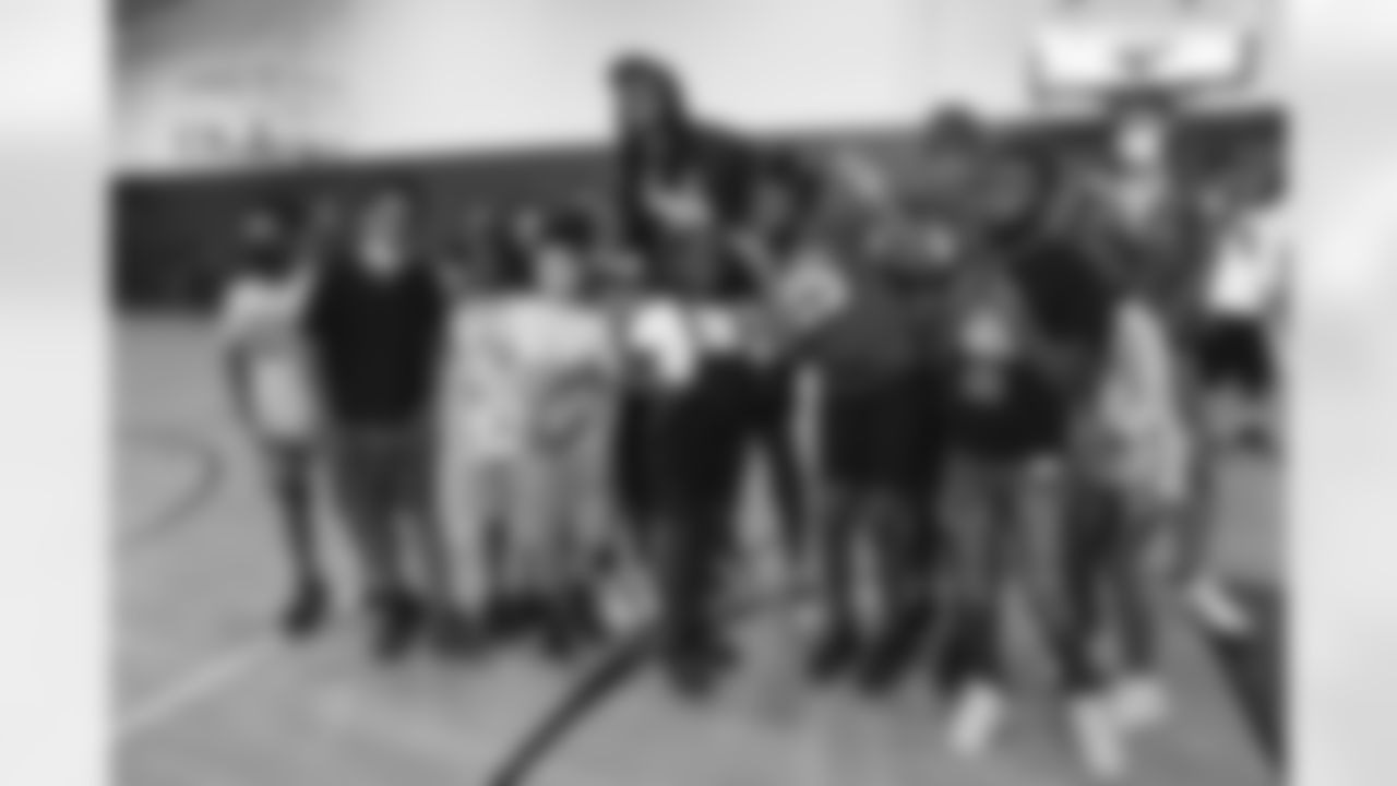 Tremaine Edmunds hands out shoes and school supplies at the Boys and Girls Club of Buffalo, Masten Club House, on August 15, 2022. Photo by Ben Green