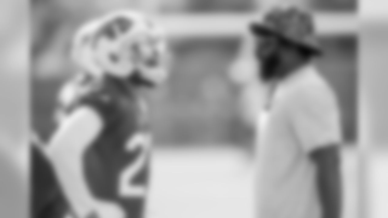 Bills safety Duke Williams talks to Buffalo's assistant defensive backs coach Ed Reed, during Week 2 of OTAs.