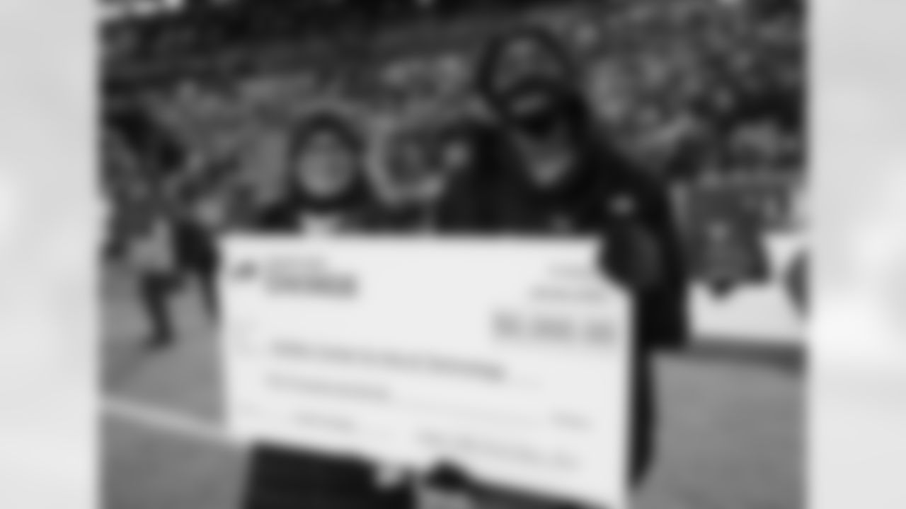 Gina Burkhardt and Kyle Everette representing Buffalo Center for Arts and Technology during the Inspire Change Pregame Ceremony. Buffalo Bills vs New York Jets at Highmark Stadium on January 9, 2022.
Photo by Craig Melvin