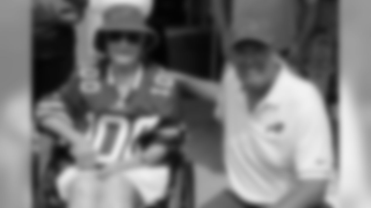 Head coach Rex Ryan and Mary Rose pose for a photo.