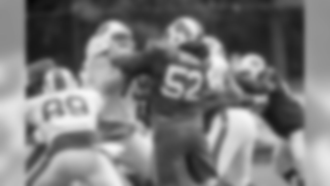 Linebacker Preston Brown (52) goes up against offensive tackle Jordan Mills.