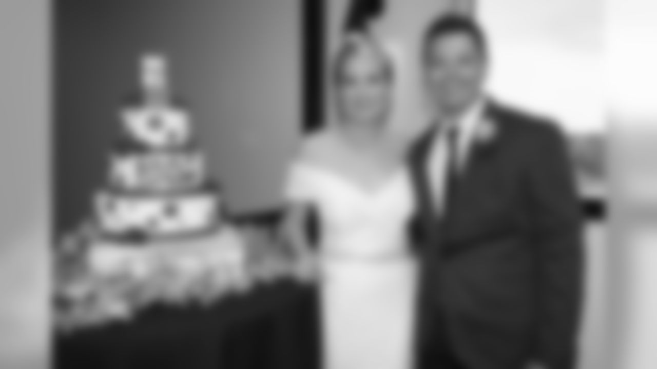The Buffalo Bills celebrate the marriage of Mackenzie Park and Jordan Binggeli, the winning couple from the “Halftime Wedding Experience of a Lifetime†contest, at New Era Field on September 29, 2019.