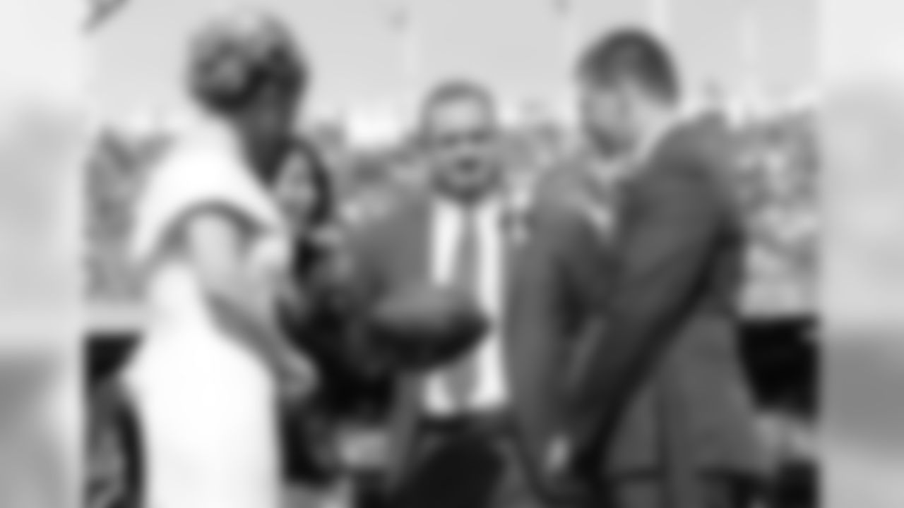 The Buffalo Bills celebrate the marriage of Mackenzie Park and Jordan Binggeli, the winning couple from the ÒHalftime Wedding Experience of a LifetimeÓ contest, at New Era Field on September 29, 2019.